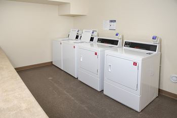 Coinless laundry facility